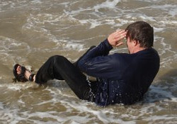 beach surf sit-up fully clothed